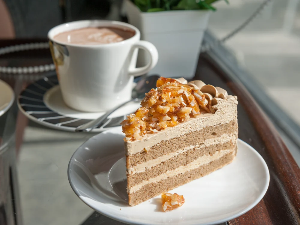 Coffee paired with a slice of cake